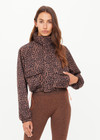 THE UPSIDE women's leopard recycled Ludlow Ace Shell Jacket offers a water resistant, cropped design with front pocket, elasticated cuffs and an orange drawcord at waist. Made for running.