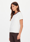 THE UPSIDE women's cream organic cotton Zahra Rib Tee features a rib fabrication and striped neckline in navy and tan. Made for lifestyle.