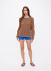 THE UPSIDE women's brown organic cotton Avalon Bayli Knit Crew is a crew neck sweater with drop shoulders in brown, a ribbed neckline in contrast blue and open knit construction. Made for lifestyle.