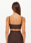 THE UPSIDE women's brown eco tech Oxford Hutton Scoop Sports Bra offers a mid coverage shelf bra with removable cups and adjustable straps. Designed with lilac coloured binds down the side. Made for high impact.