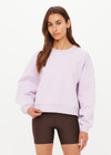 THE UPSIDE women's purple 100% organic cotton Paloma Crew features a ribbed neckline, cuff and hems in a relaxed fit. Made for lifestyle.