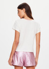 THE UPSIDE women's cream McGrath The 70's Tee is 70's inspired, crafted from a hemp and organic cotton blend and features a contrast rib neckline in pink. Made for everyday wear.