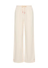 THE UPSIDE women's cream cotton Noosa Calling Track Pant is a low-rise straight leg pant with a soft elastic waistband, made from soft brushed recycled fabric. Made for lifestyle.
