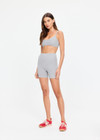 THE UPSIDE women's grey cotton Flash Scoop Neck Sports Bra offers low coverage with a scooped sweetheart neckline, soft support, and binded straps with adjusters. Made for yoga & pilates.