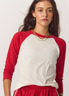 THE UPSIDE women's cream 100% organic cotton Take Me To The Ball Park Top features a soft ribbed neckline with contrast red 3/4 length sleeves. Made for lifestyle.