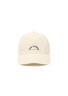 THE UPSIDE women's cream 100% cotton Marlon Soft Cap has an adjustable navy paracord tie at back with gold metal eyelets. Made for lifestyle.