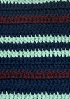 THE UPSIDE women’s stripe organic cotton Cabana Crochet Mini Bag is crossbody and handmade with a navy paracord strap and cord with toggle. Made for lifestyle.