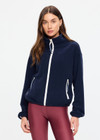 THE UPSIDE women’s navy recyled Sol Fleece Jacket offers a relaxed fit and features a zip through front, front zip pockets, elasticated waist and cuffs and contrast paracord zip pullers. Made for lifestyle.
