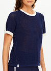 THE UPSIDE women’s navy 100% organic cotton Fenway Jordan Knit Tee offers a relaxed fit and features an open knit construction, contrast sleeve stripe detailing and ribbed trims. Made for lifestyle.
