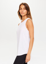 THE UPSIDE women's white Dri Release Markova sleeveless Tank is made from moisture-wicking, fast-drying fabric with odor control and superior comfort.