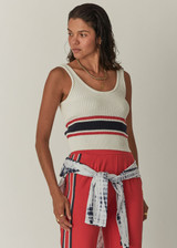 THE UPSIDE Panama Ophelia Knit Top in White is a sustainable organic cotton scoop neck knitted tank with a rib knit hem and red and navy knit stripes.