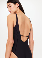THE UPSIDE Paradox Pointe Bodysuit in Black is a sustainable mid coverage scooped neckline bodysuit with straight back straps, curved panelling detail and gold arrow branding at centre back.
