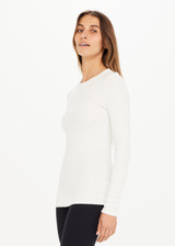 THE UPSIDE white Chrissy Long Sleeve top made from organic cotton is designed for a slim fit and features ribbed fabrication, crew neck and an embroidered tonal arrow logo.