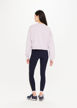 - THE UPSIDE Akasha Dominique Crew in Orchid Purple is a sustainable organic cotton fleece crew with a high neck band in soft rib and cropped in length.