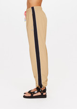 THE UPSIDE Altitude Kendall Pant in Chestnut Brown is a recycled pant with contrast side panels and piping, pockets and elasticated waistband with a two tone paracord.