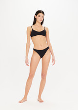 THE UPSIDE Camp Cove Moss Pant in Black is a recycled mid coverage bikini pant in our soft recycled ribbed fabrication.