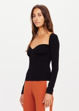 THE UPSIDE x THE BANAYA black Romy Top is a recycled knit blend long sleeve top designed for a slim fit. It features a wide open sweetheart neckline and fitted sleeves.