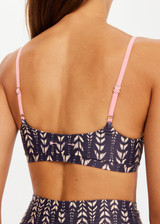 THE UPSIDE womens dark blue abstract pattern Mystic Ballet Bra made in Original Super Soft fabric is a low coverage bra featuring a feathered arrow print and contrasting pink adjustable straps.