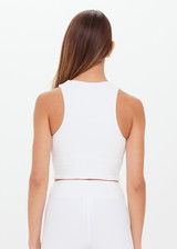 THE UPSIDE womens white high neck Jacinta Crop Tank made with Recycled Peached fabric features a built in shelf bra and removable cups, designed for layering.
