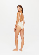 THE UPSIDE golden Sands Claudina One Piece is fully lined and features textured fabrication with gold lurex thread, scoop neck, lower back and bagged out edges for a soft and comfortable fit.