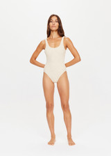 THE UPSIDE golden Sands Claudina One Piece is fully lined and features textured fabrication with gold lurex thread, scoop neck, lower back and bagged out edges for a soft and comfortable fit.