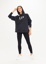 THE UPSIDE womens black regular fit Koda Hoodie made with organic cotton french terry fabric features printed logo on front, front pouch pocket and soft rib cuffs and hem band, great as loungewear.