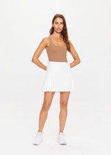 THE UPSIDE womens white pleated Pasadena Cher Skirt made with organic cotton features built in shorts with pockets, designed for golf or tennis.