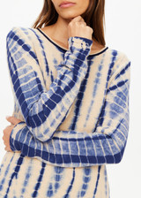THE UPSIDE women's navy and creme tie dye Wishbone Amana Long Sleeve is made with organic cotton, designed for a relaxed fit. This knitted lifestyle top features a stripy rib neckline.