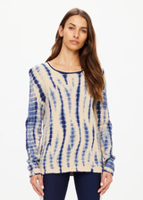 THE UPSIDE women's navy and creme tie dye Wishbone Amana Long Sleeve is made with organic cotton, designed for a relaxed fit. This knitted lifestyle top features a stripy rib neckline.