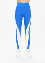 THE UPSIDE women's blue Lazuli 25 Inch Midi Pant is made in Recycled Peached fabric. This mid-rise yoga pant features a 25 inch leg and moisture wicking properties.