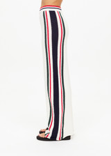 THE UPSIDE women's white Reverie Kansas Pant is made with an open knit organic cotton, designed for an oversized fit. This wide-leg pant features an elastic waist. Designed for leisure.