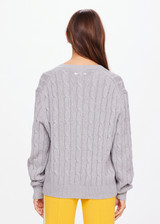 THE UPSIDE women's grey Seymour Cable Knit Sweater is made from organic cotton. Featuring a V shape neckline and ribbed cuffs, hem and neckline for comfort and style. Designed for leisure and recovery.