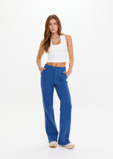 THE UPSIDE women's blue Fontana Straight Leg Pant is made from organic cotton. The true to size pants features pockets and zip fly front. Designed for golf.