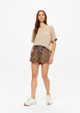 THE UPSIDE women's brown Palmino Sammi Tee is made from organic cotton. The oversized t-shirt features a soft rib neckline. Designed for comfort.