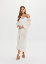 THE UPSIDE women's cream Dusty-Ray Crochet Dress is made from organic cotton. The maxi dress features boat neck and 3/4 sleeve. Designed for lounging and layering.