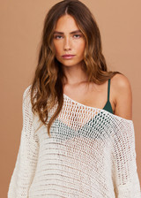 THE UPSIDE women's cream Dusty-Ray Crochet Dress is made from organic cotton. The maxi dress features boat neck and 3/4 sleeve. Designed for lounging and layering.
