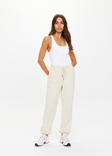 THE UPSIDE women's white organic cotton Hamilton Aries Track Pant is designed for a regular fit and features elasticated waistband and side seam pockets. Perfect for everyday.