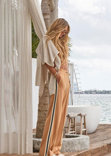 THE UPSIDE women's yellow Le Sport Marine Wide Leg Pant is a high-rise fit with an elasticated waistband and drawcord, featuring side seam pockets. Perfect for everyday.