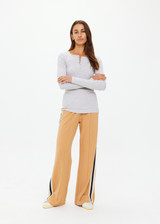 THE UPSIDE women's grey marle organic cotton Ness Ribbed Long Sleeve Top is designed for a slim fit. Perfect for layering and styling up and down.