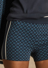 THE UPSIDE women's blue organic cotton Lumiere 3 Inch Knit Short is a mid rise comfortable fit and features a soft elasticated waistband in a geometric star design. Made for lifestyle.