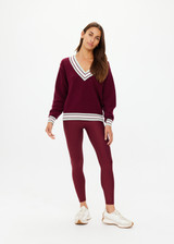 THE UPSIDE women's merlot organic cotton Josette V Neck Knit Sweater is a regular fit and features striped neckline in mint and white. Made for lifestyle.