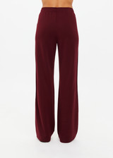 THE UPSIDE women's merlot Vitesse Marine Wide Leg Pant is a high rise fit and features a elasticated waistband, drawcord and side seam pockets in slinky fabrication. Made for lifestyle.