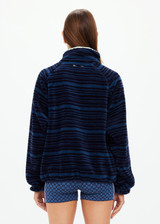 THE UPSIDE women's blue stripe Harlow Fleece Pullover is designed for a relaxed fit and features zip pockets and elasticated waist and cuffs. Made for lifestyle.