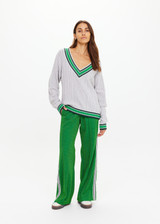 THE UPSIDE women's grey marle organic cotton Josette V Neck Knit Sweater is a regular fit and features cable detailing through front and a green striped neckline. Made for lifestyle.