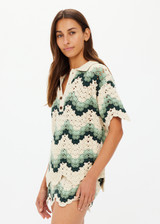 THE UPSIDE women's green organic cotton Tidal Sagra Crochet Shirt is designed for a relaxed fit and features tortoiseshell buttons at opening. Made for everyday leisure.