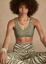 THE UPSIDE women's green Reversible Isaac Bra is designed for a soft & supportive fit in a recycled fabric and features a V neckline. Made for yoga & pilates.