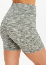 THE UPSIDE women's green Reversible 5inch Spin Short is designed for a soft & supportive fit in a recycled fabric and features embroidered arrow logo on back. Made for yoga & pilates.