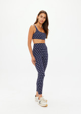 THE UPSIDE women's navy Cruzada Bridie Bra is a soft & supportive fit in a recycled jacquard rib fabrication in mini flag design and features removable cups. Made for yoga & pilates.