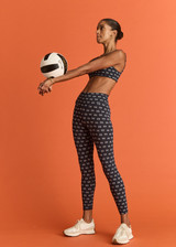 THE UPSIDE women's navy Cruzada 25inch Legging is designed for a soft & supportive fit in a jacquard rib fabrication in mini flag design. Made for yoga & pilates.