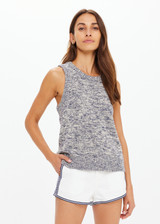 THE UPSIDE women's blue marle organic cotton linen Armada Koby Knitted Tank Top is true-to-size and features a high neckline with a subtle racer back detail. Made for lifestyle.